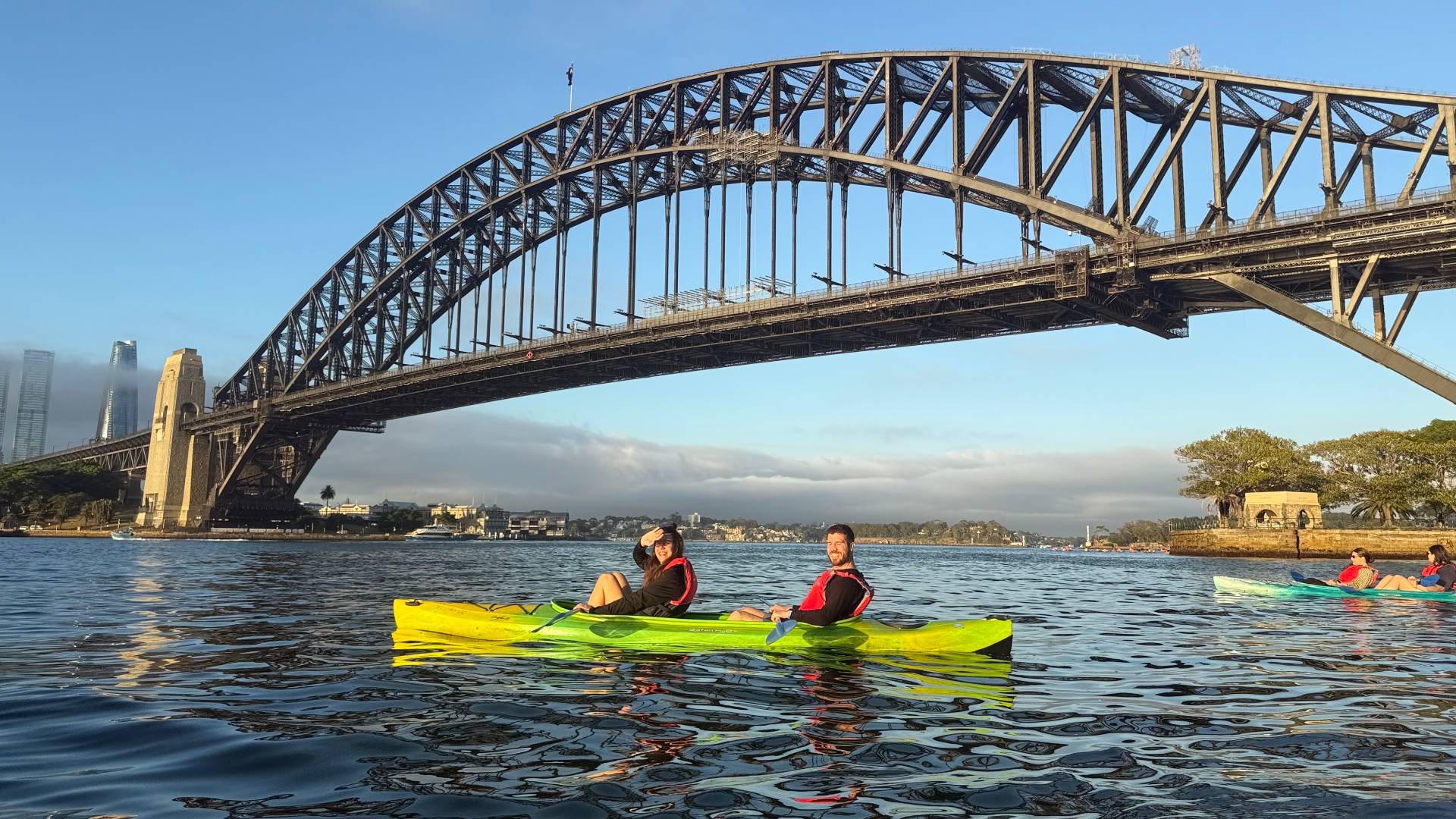 Couple laughing on Sydney Harbour kayak adventure