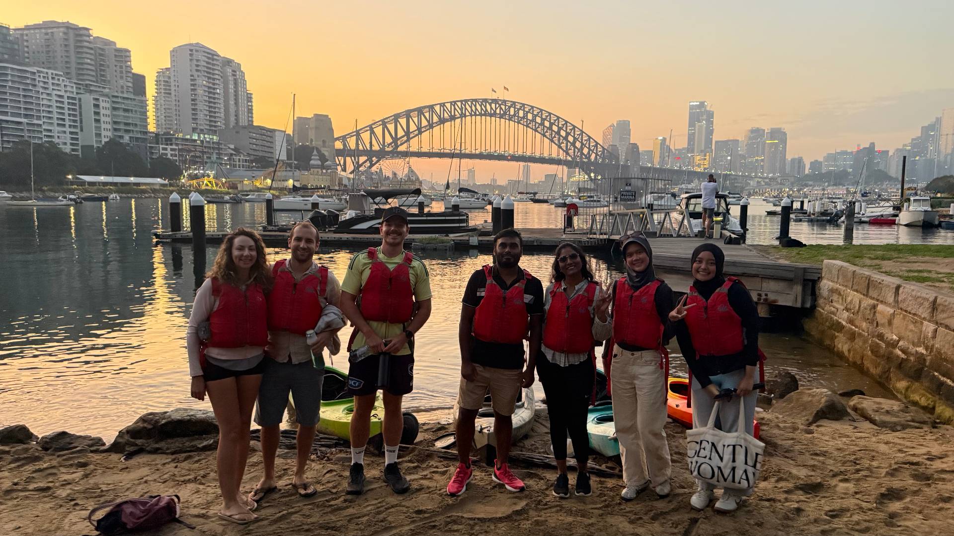 Sydney Kayak Tours group photo on Lavender Bay beach