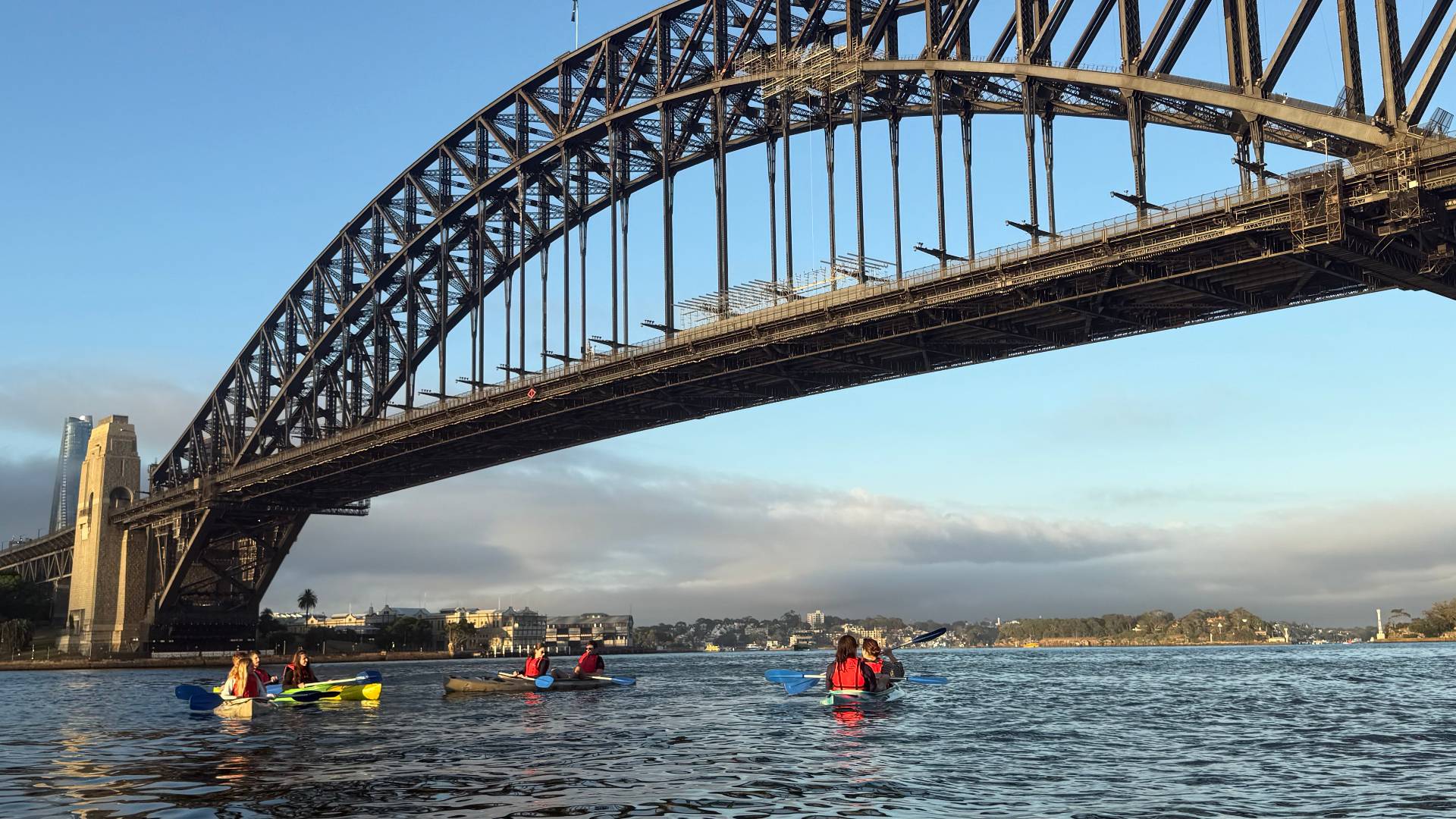 Sydney Kayak Tours – paddling under the Harbour Bridge structure